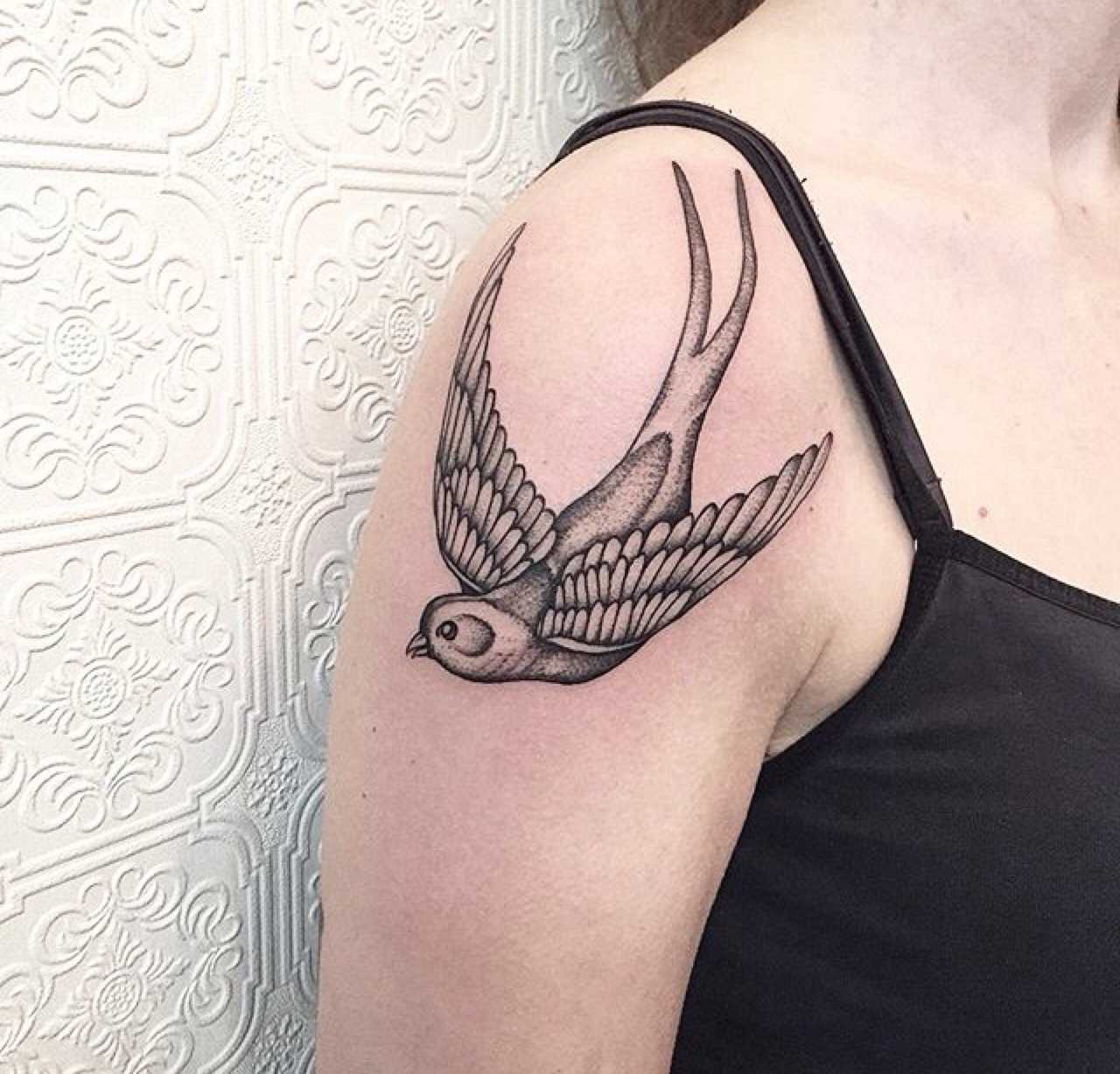 Swallow tattoo by Johno Tattooer