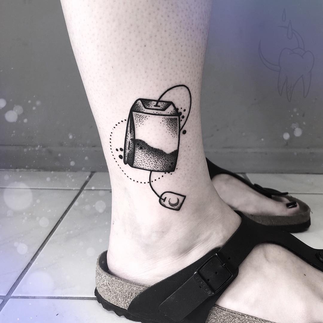 Tea bag tattoo on the shin