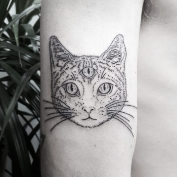 Three-eyed cat tattoo