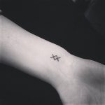 Tiny Inguz tattoo on the wrist
