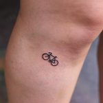 Tiny bicycle tattoo by Yi.postyism