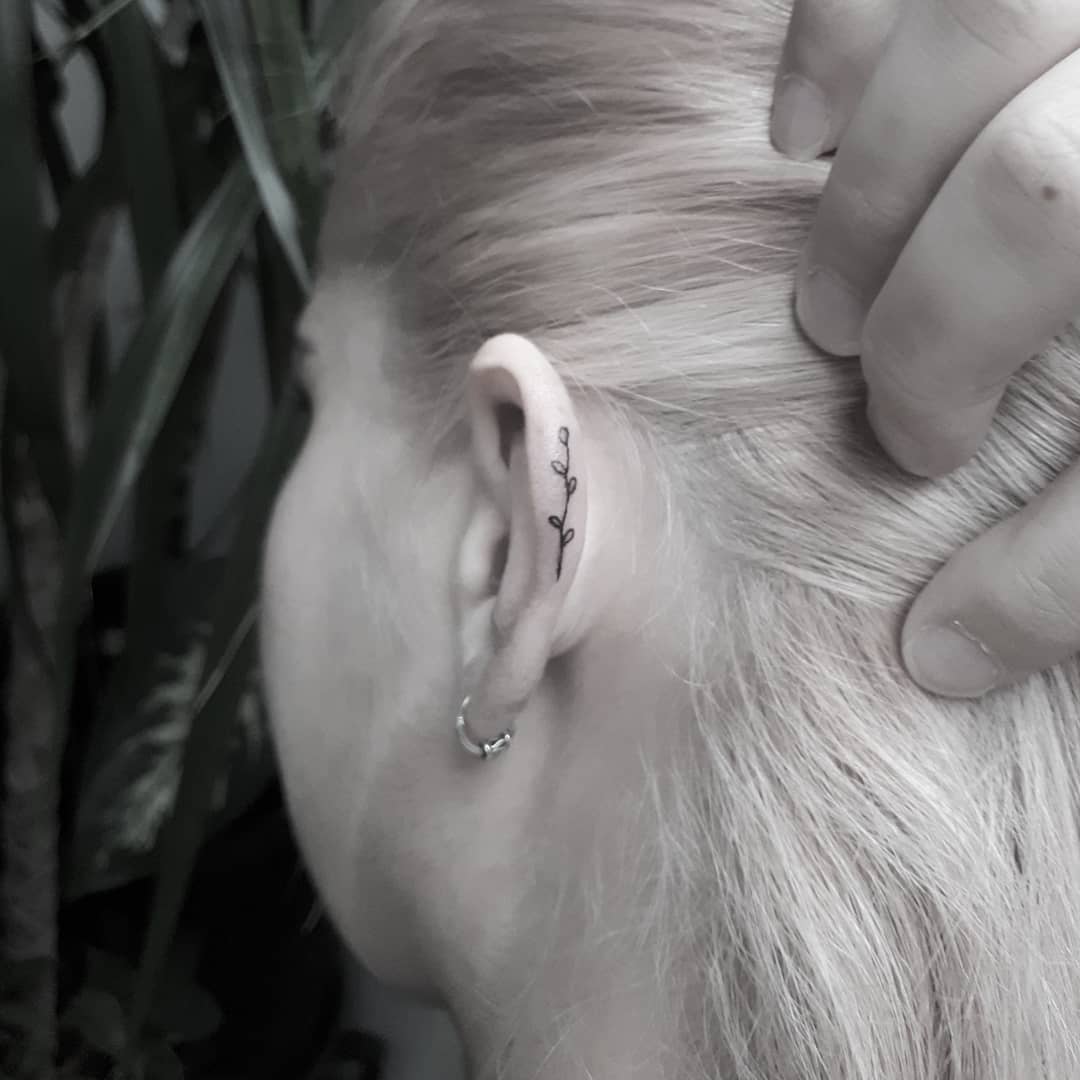 Tiny flower on the left ear