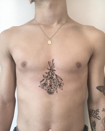 Upside down flower bouquet tattoo