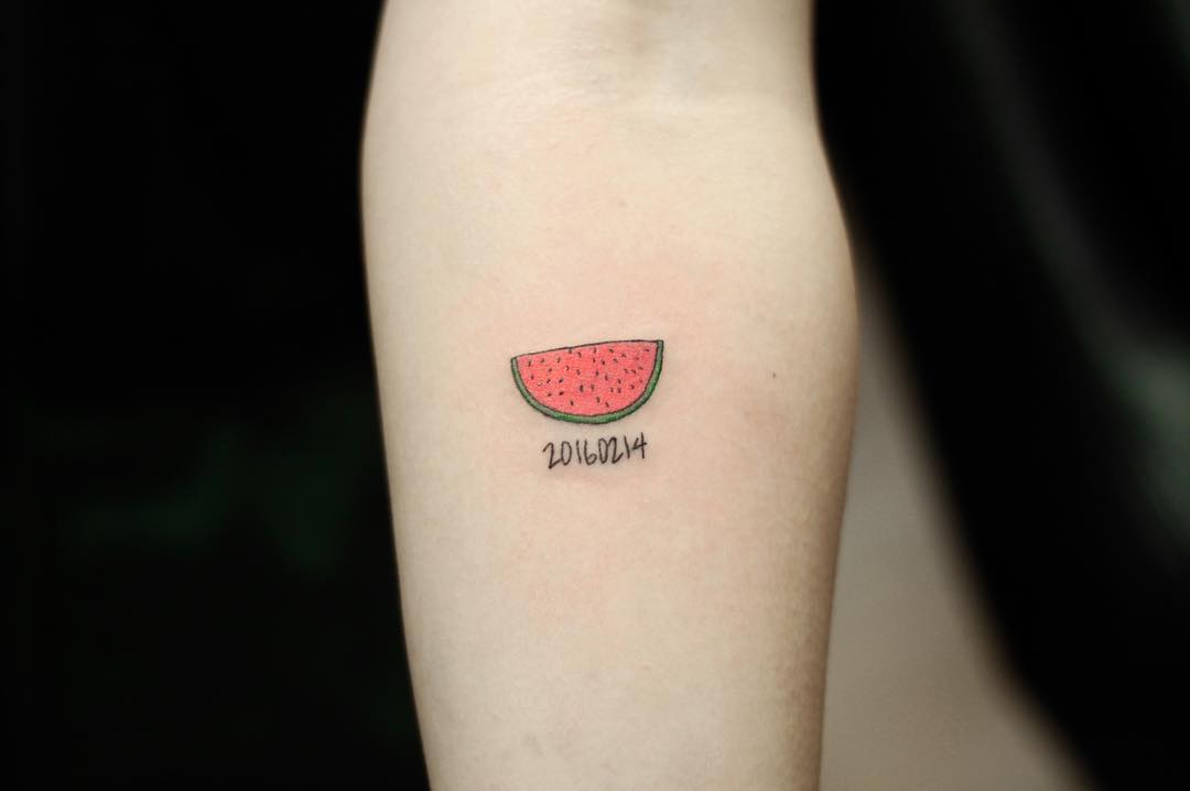 Watermelon slice tattoo by Yuni