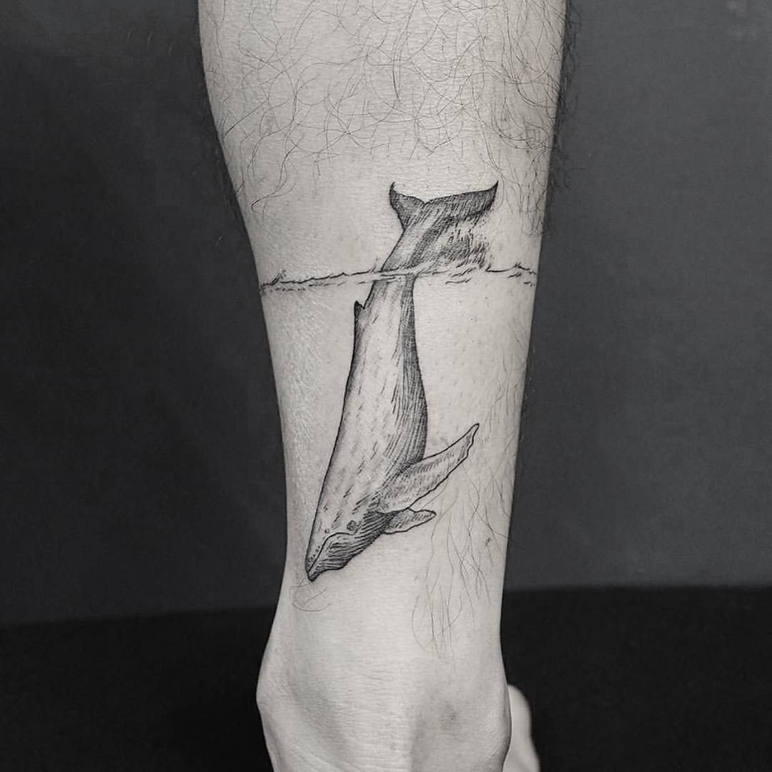 Whale wrapped around the calf by Ek.ek.tattoos