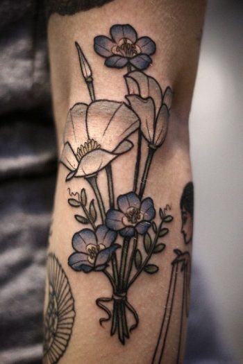 White and blue flower bouquet tattoo