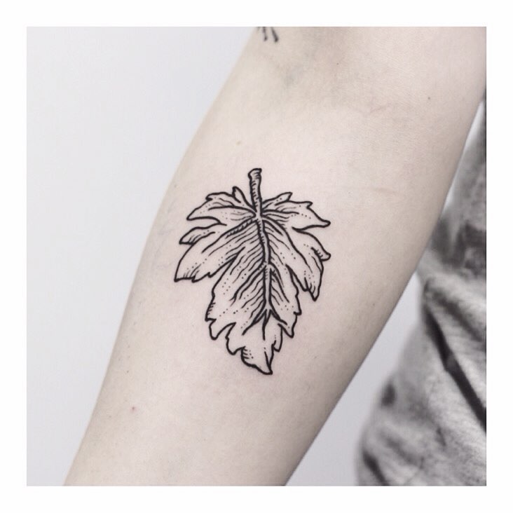 Woodcut leaf tattoo