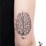 Woodcut style brain tattoo