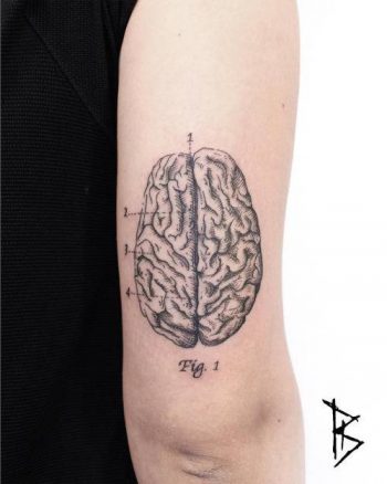 Woodcut style brain tattoo