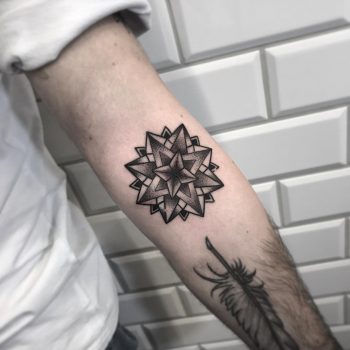 3D blackwork mandala tattoo