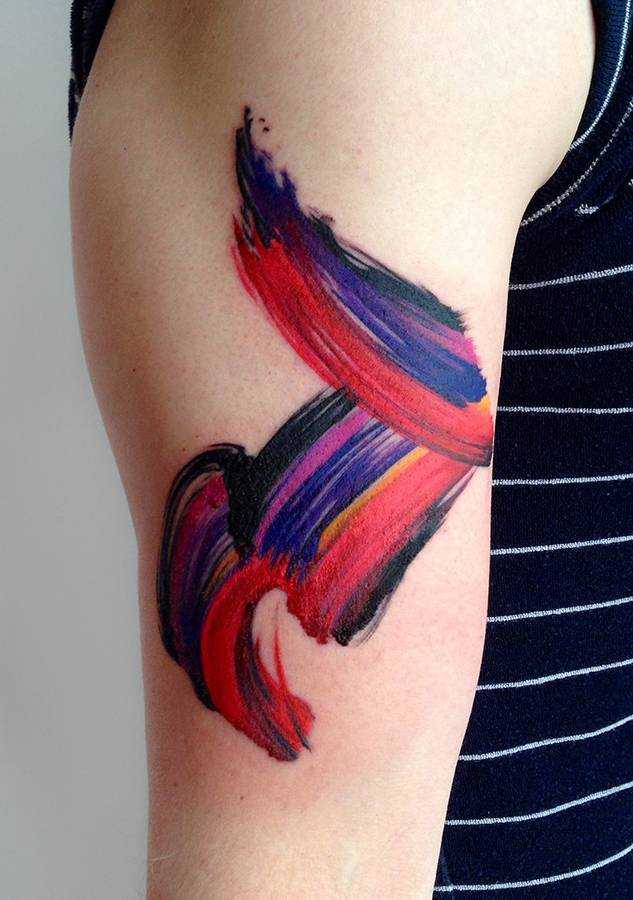 Abstract red and blue brushstroke tattoo