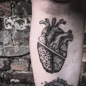 Anatomical blackwork heart and brain tattoo