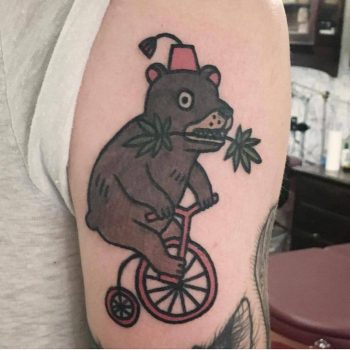 Bear on a bicycle by Jiran Tattoo