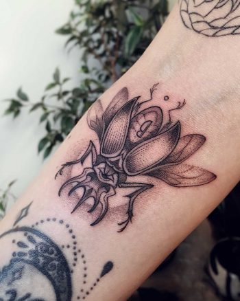 Black beetle tattoo