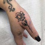 Black rose on the right thumb