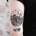 Blackwork landscape and rose tattoo
