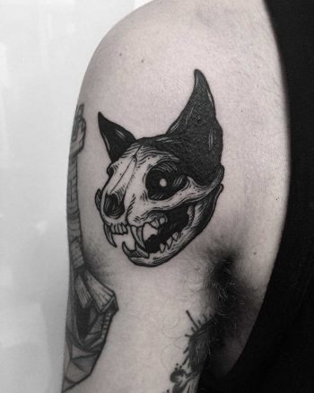 Cat skull done at Primordial Pain Tattoo