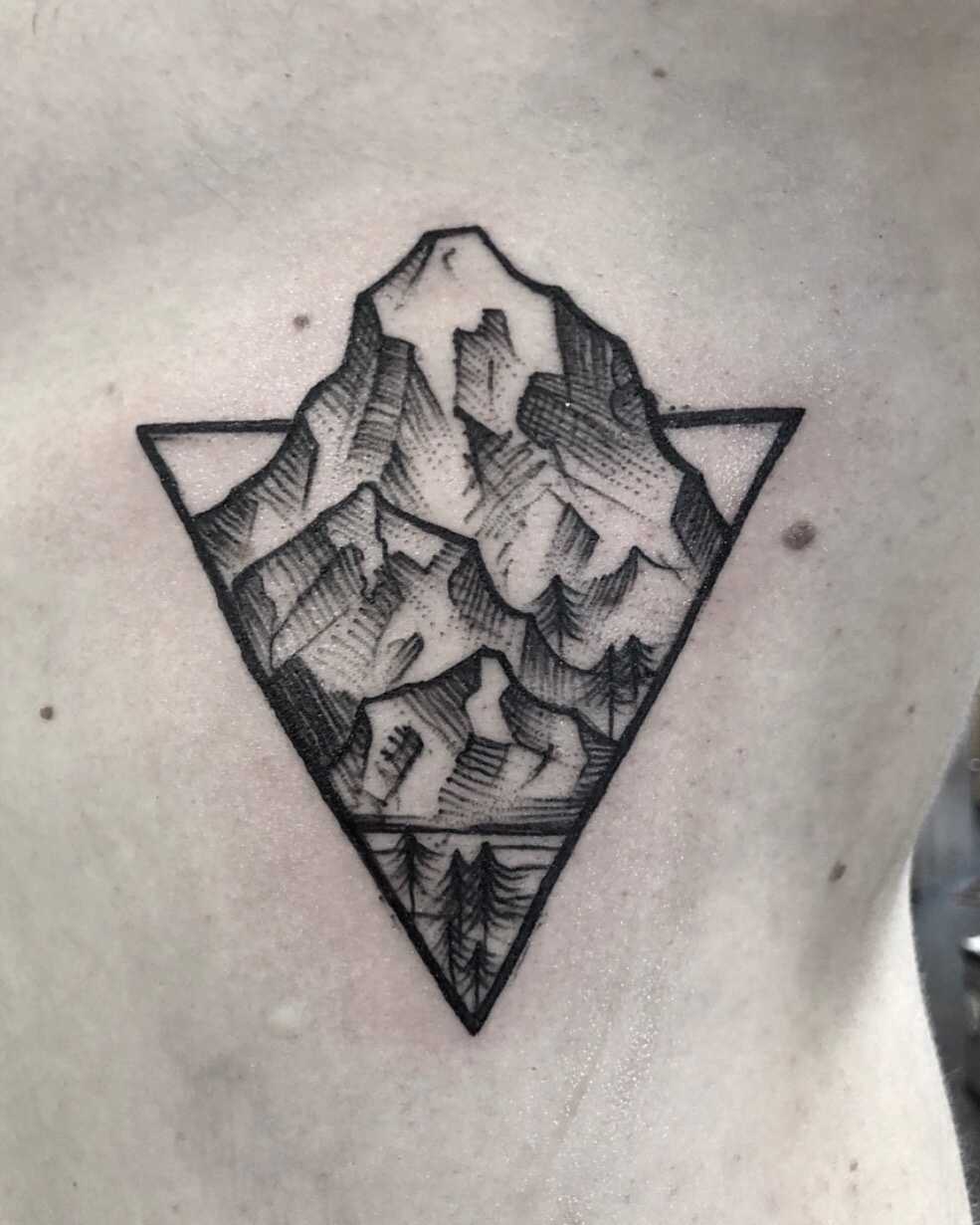 Cliff in a triangle tattoo