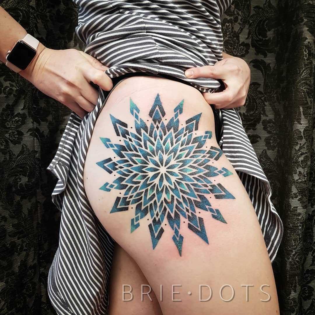 Colorful mandala tattoo by Brie Dots