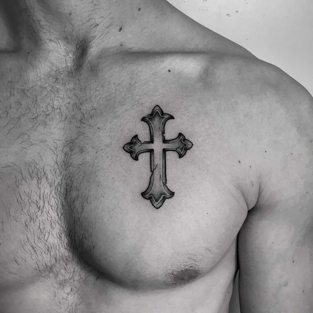 Cross on the chest - Tattoogrid.net