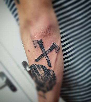 Crossed axes by Freaks And Geeks Tattoo