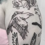 Crow tattoo on the arm