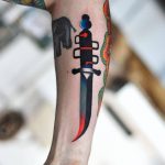 Dagger tattoo by David Côté
