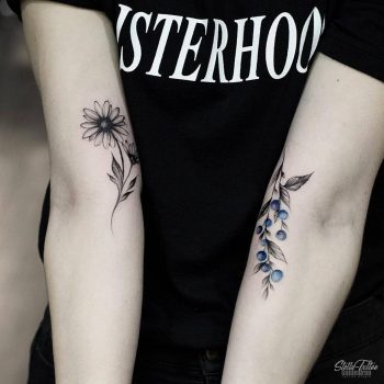 Daisy and blueberries tattoos