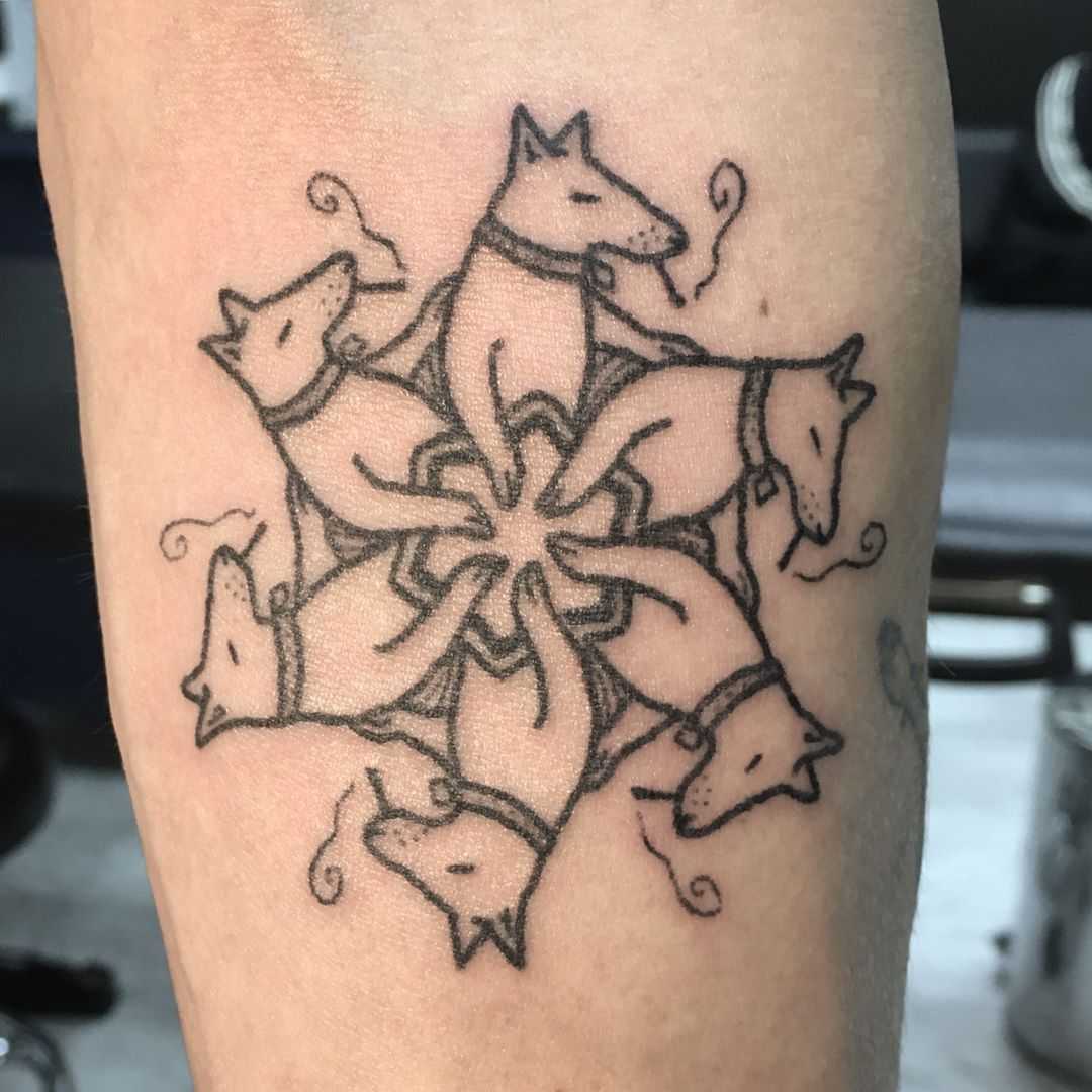 Dog poker party tattoo