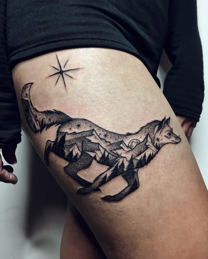 Double exposure fox and mountains tattoo