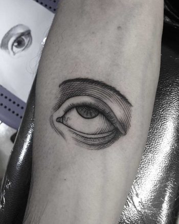 Etching eye tattoo done at Primordial Pain Tattoo, Milano