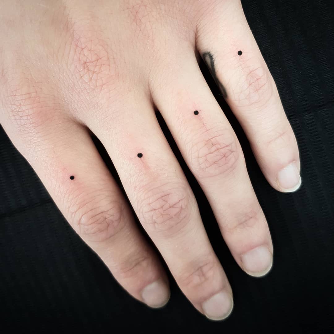 Finger dots done at Mu Body Arts