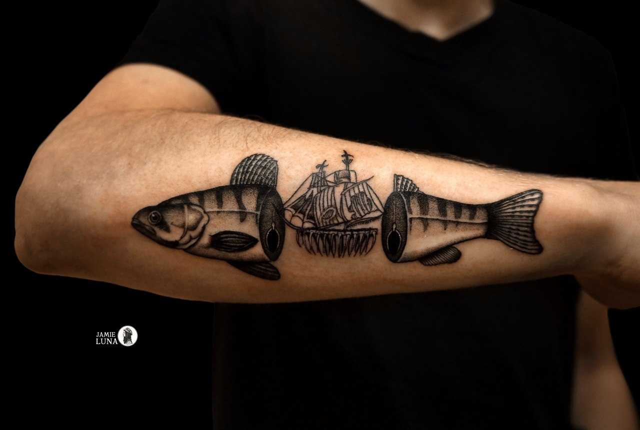 Fish and ship tattoo