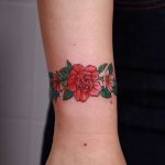 Floral bracelet done at High Tension Tattoo