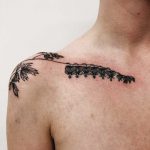 Flower tattoo on the shoulder and clavicle bone