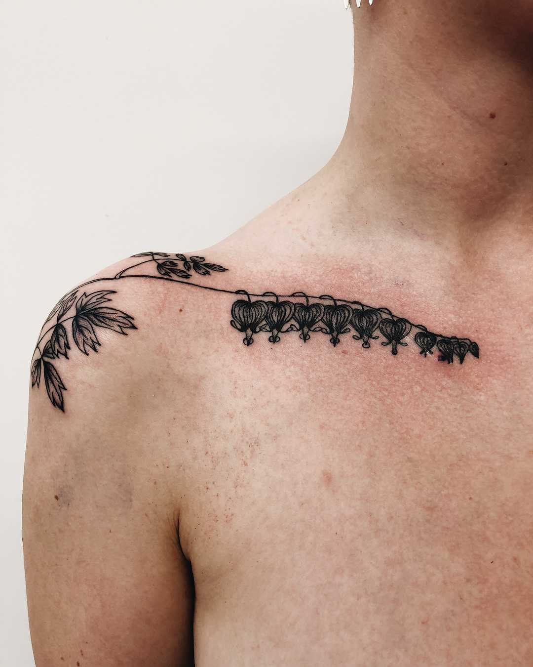 Flower tattoo on the shoulder and clavicle bone