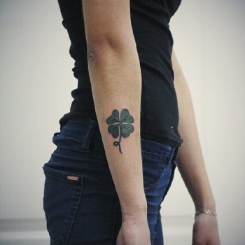 Four-leaf clover on the forearm