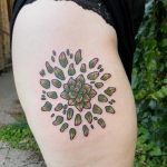 Green floral mandala tattoo