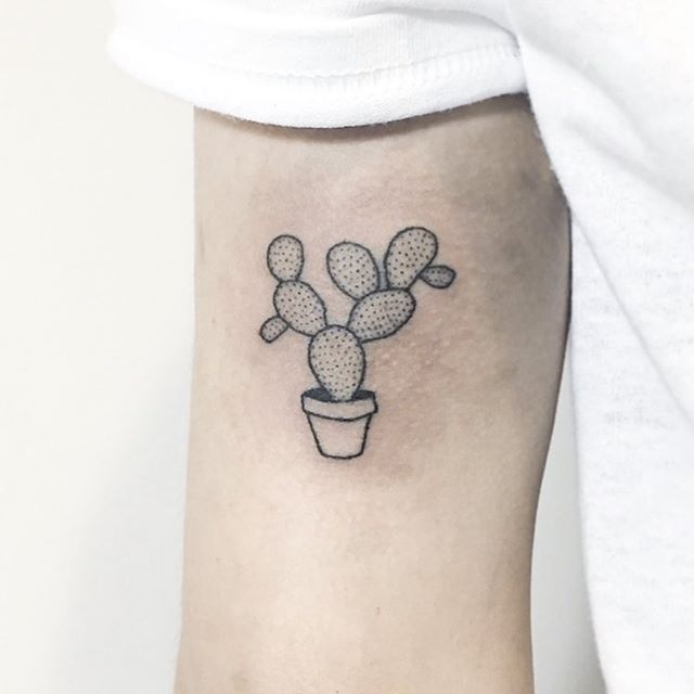 Hand-poked cactus tattoo by Alex Royc