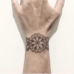 Hand-poked floral wristband