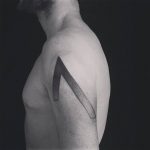 Hand-poked sharp edge geometric shape tattoo
