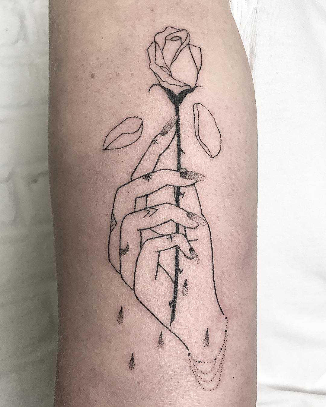 Hand with a rose by Femme Fatale Tattoo