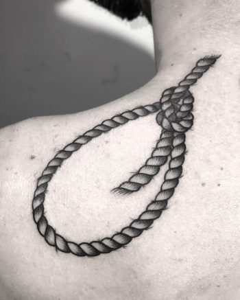 Hangman's knot tattoo on the shoulder