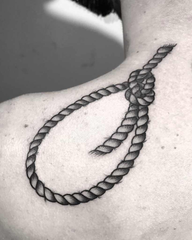 Hangman’s knot tattoo on the shoulder