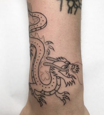 Happy dragon by Femme Fatale Tattoo