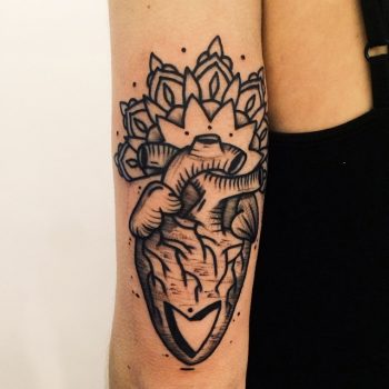 Heart-mandala tattoo