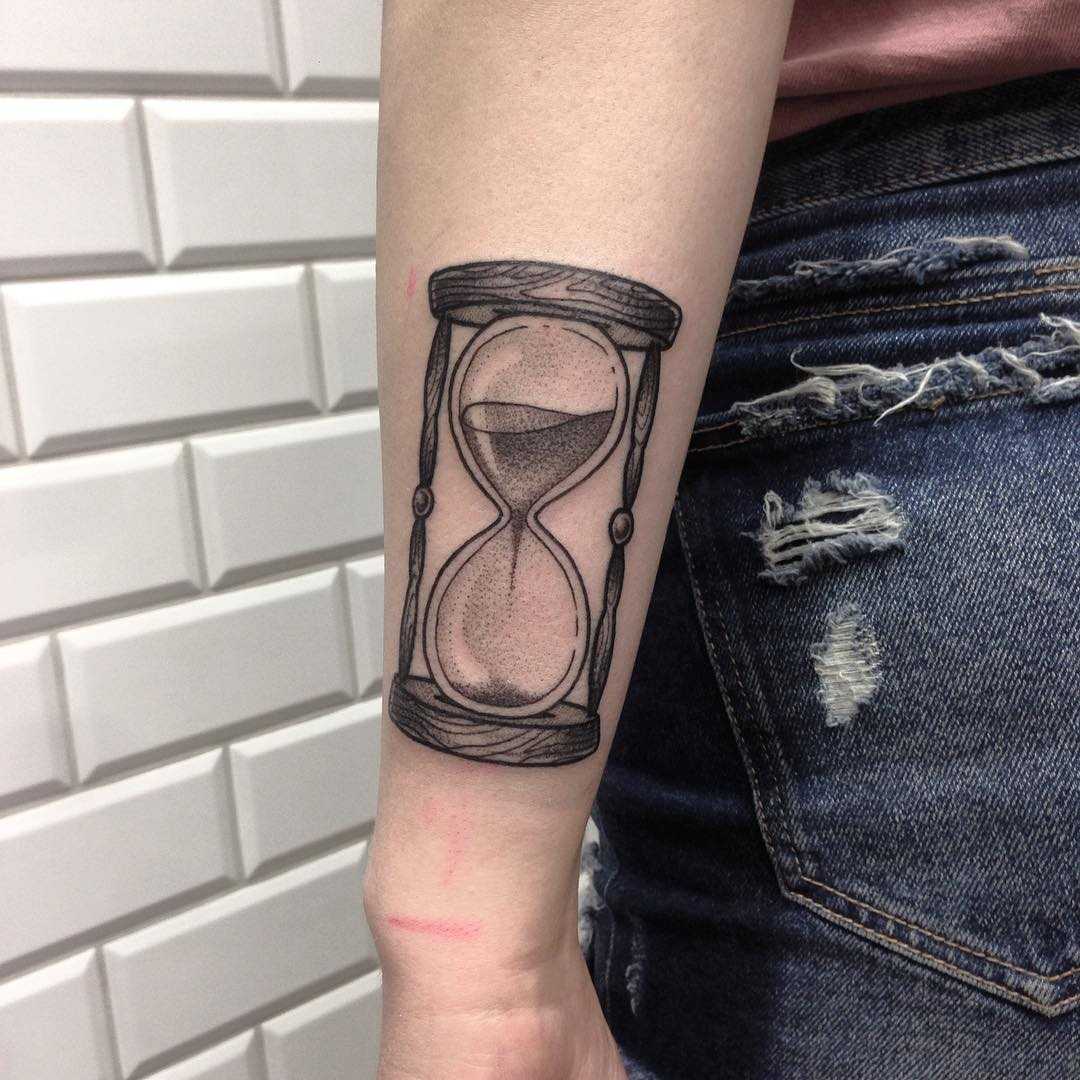 Hourglass on the forearm done at Kult Tattoo Fest
