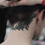 Laurel wreath tattoo on the neck