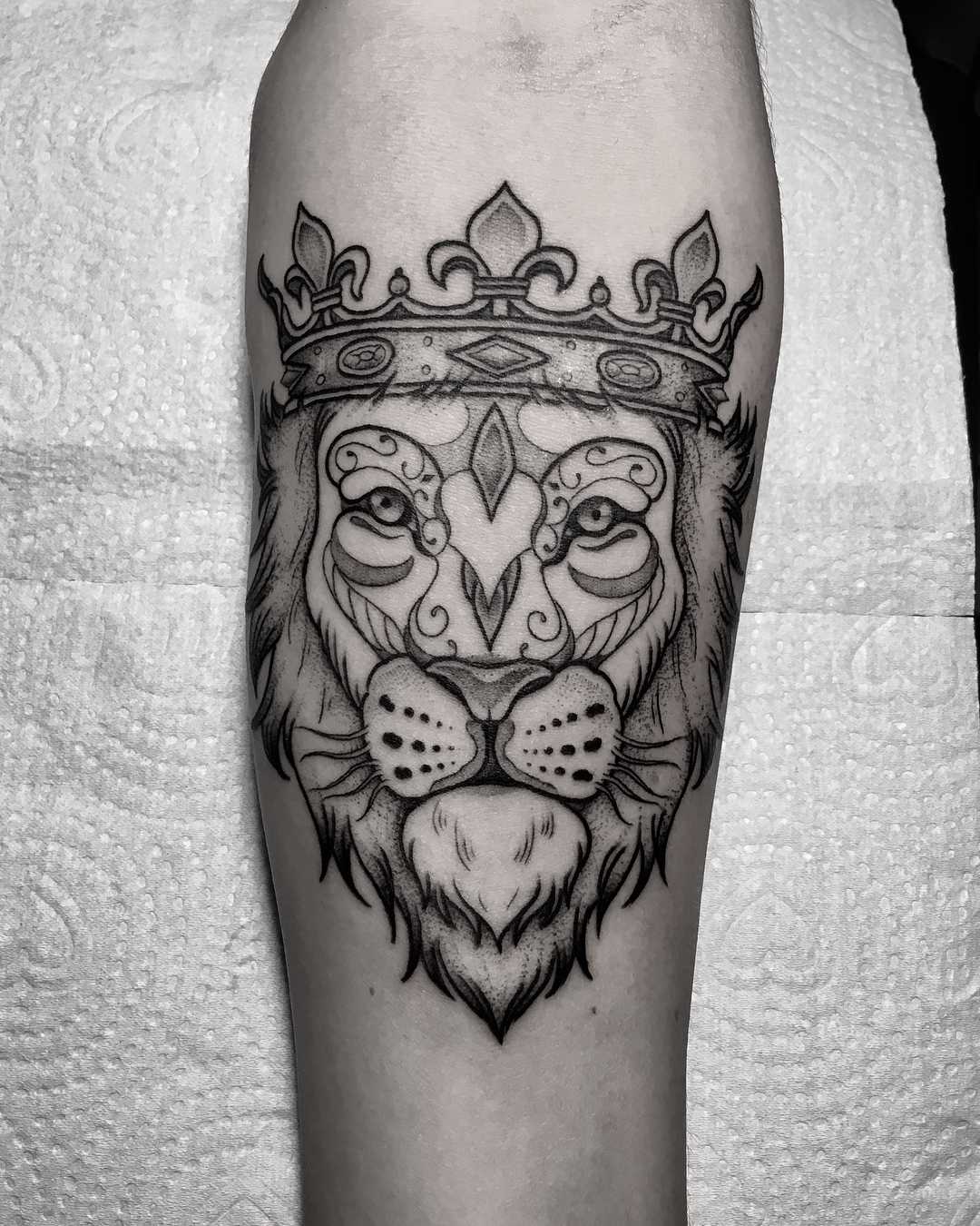 lion crown tattoo