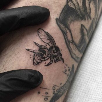 Little blakc wasp tattoo